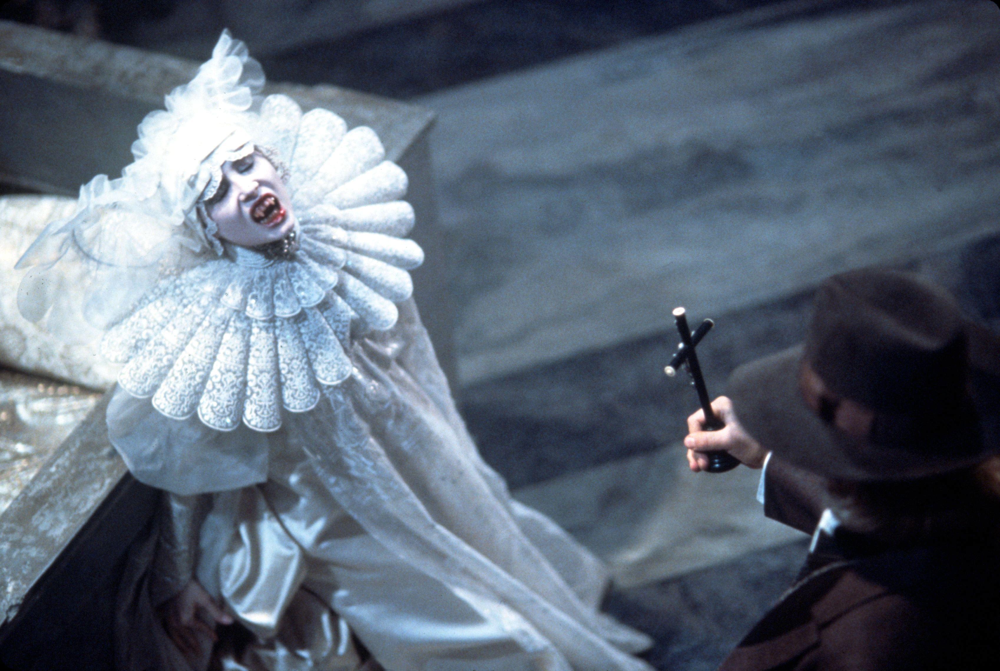 1992, Film Title: BRAM STOKER'S DRACULA, Director: FRANCIS FORD COPPOLA, Studio: COLUMBIA, Pictured: 1992, DRACULA & OTHER VAMPIRES, SADIE FROST, ANTHONY HOPKINS, TEETH, BLOOD, CRUCIFIX, LACE.